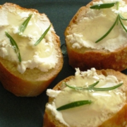 Crostini with goat cheese, honey, rosemary